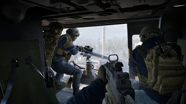 WARDOGS soldiers riding inside a transport vehicle
